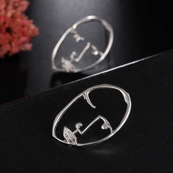 2/$20! Silver Abstract Visage Earrings - Picture 5 of 11